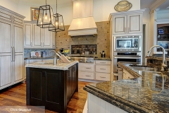 off_white_cabinets_dark_wood_kitchen_island